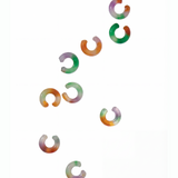 Colorful jade ear cuffs on a white background