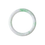 A round jadeite bangle bracelet with a light green and white marbled pattern, shown against a plain white background.