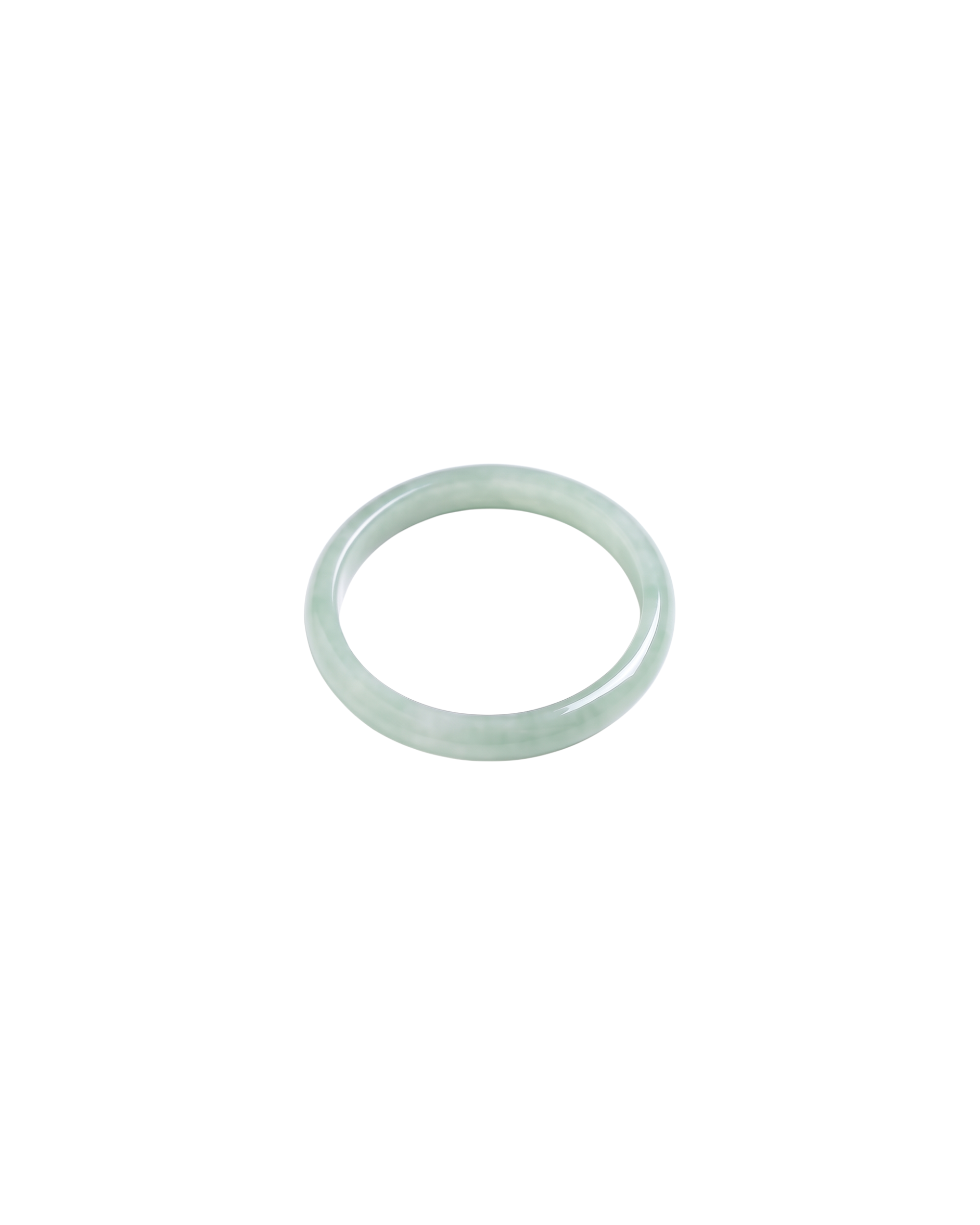 Chess skinny jade ring in untreated jadeite on a white background