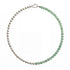 Green and silver beaded necklace showcasing a half-and-half arrangement of polished round beads with a silver clasp, shot on white background.