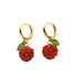 seree gold hoop earrings with raspberry charms