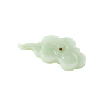 Incense holder shaped like a cloud on a white background, close-up