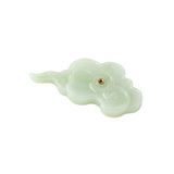 Incense holder shaped like a cloud on a white background, close-up