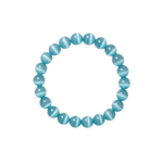 Flatlay shot of a blue cat's eye beaded bracelet on a white background