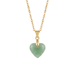 Gold necklace with a heart-shaped green pendant on a white background
