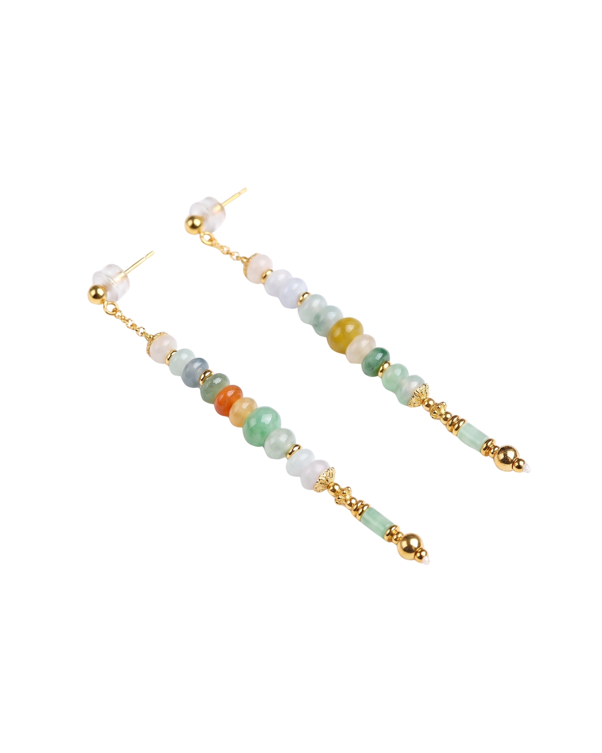 Pair of beaded earrings with gold accents on a white background