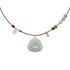 Necklace with a Buddha jade pendant on a white background