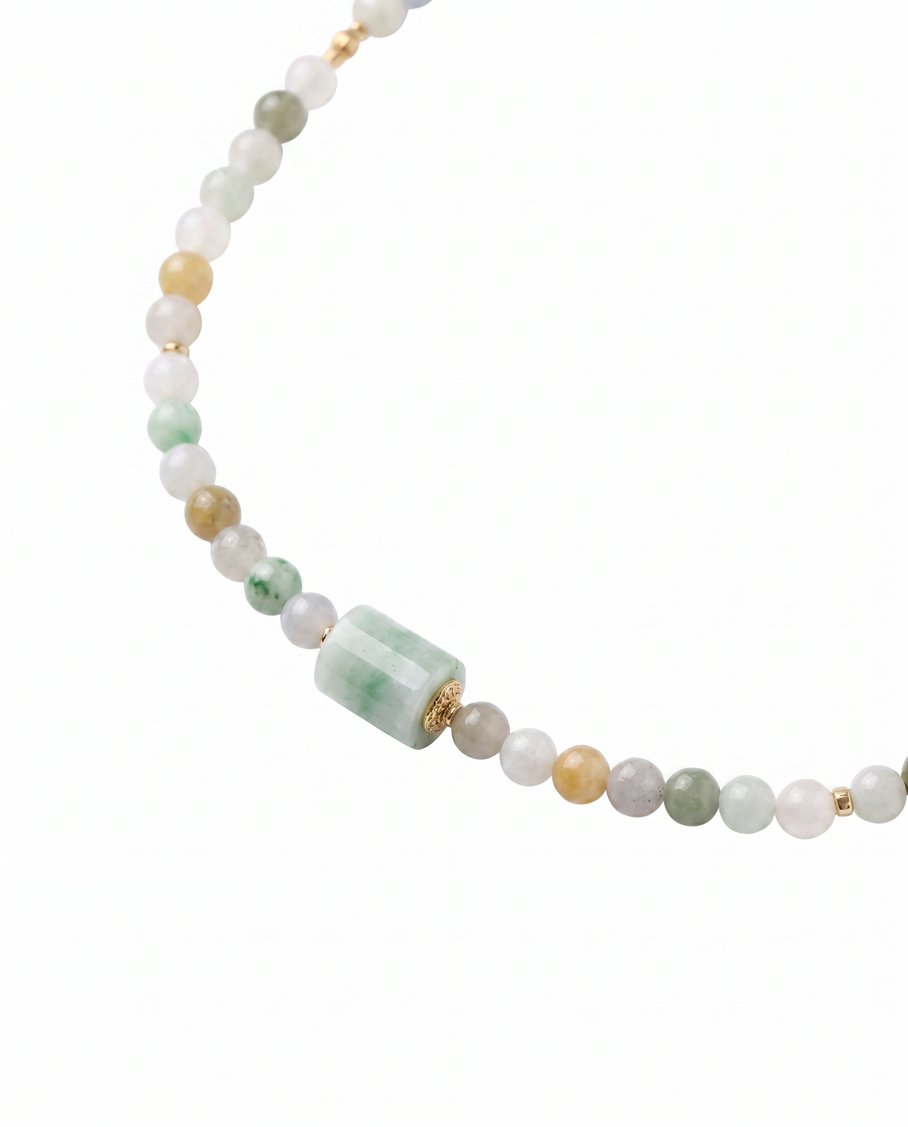 Necklace with multicolored jade beads and a jade barrel pendant on a white background, close-up
