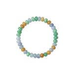 Flatlay shot of a multicolor jadeite bead bracelet featuring lavender, green, and yellow polished jade beads.