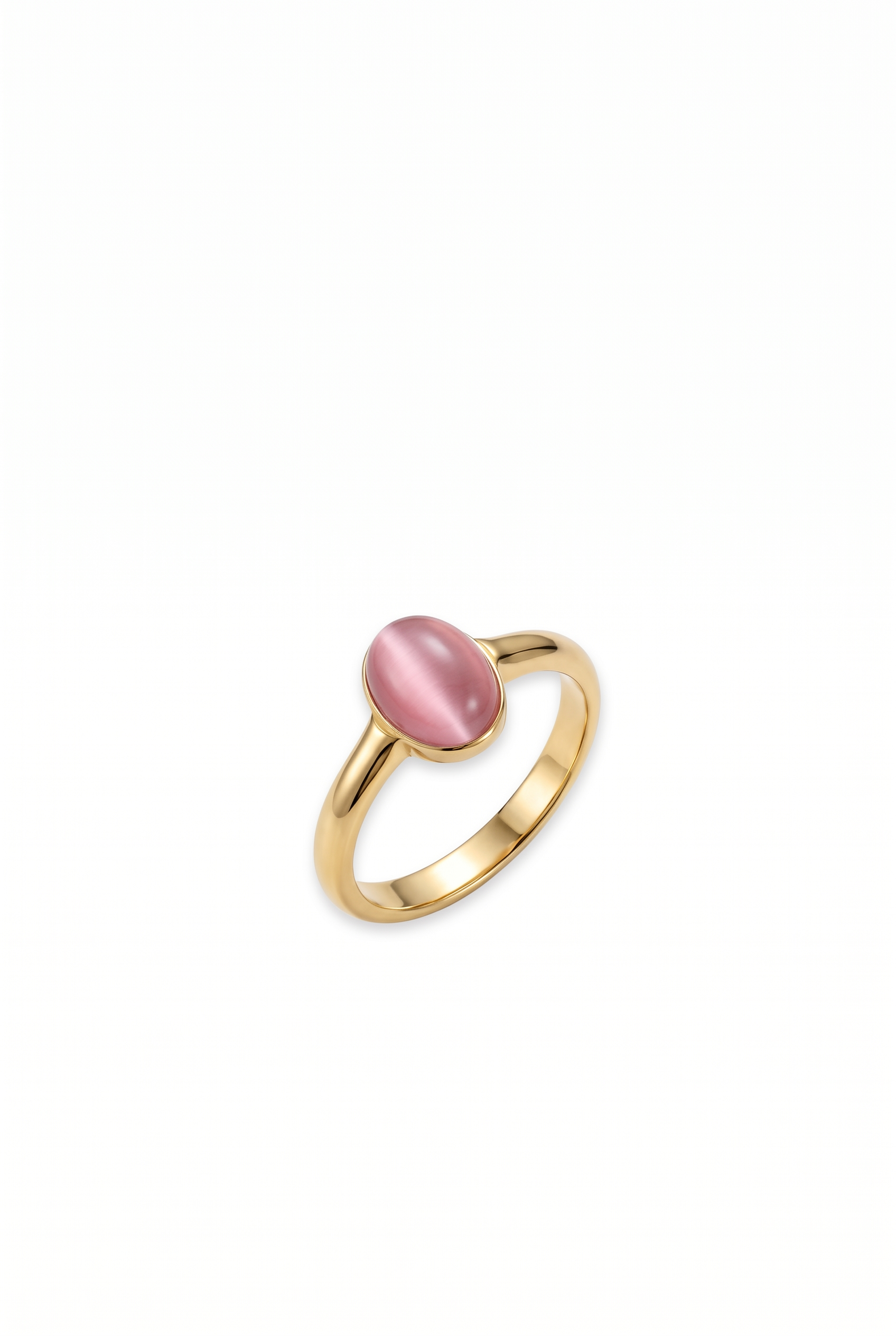 Angled shot of a gold ring with a pink gemstone on a white background