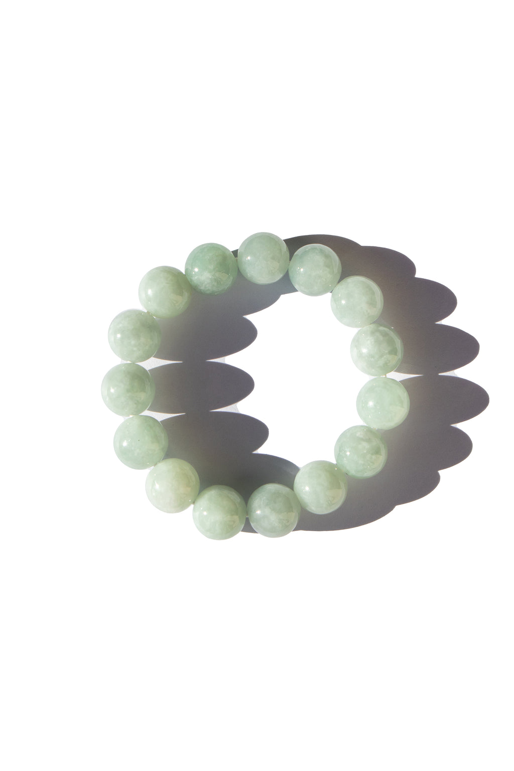seree-beaded-bracelet-in-off-white-cyan-jadeite