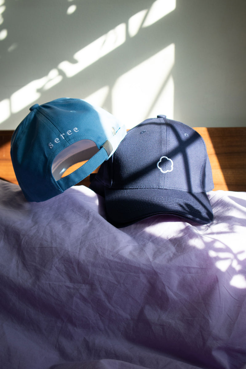 seree-logo-cap-in-navy-and-baby-blue